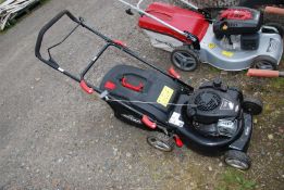 A Florabest mower with 4 stroke overhead valve engine (turns but no fuel) with grass box.