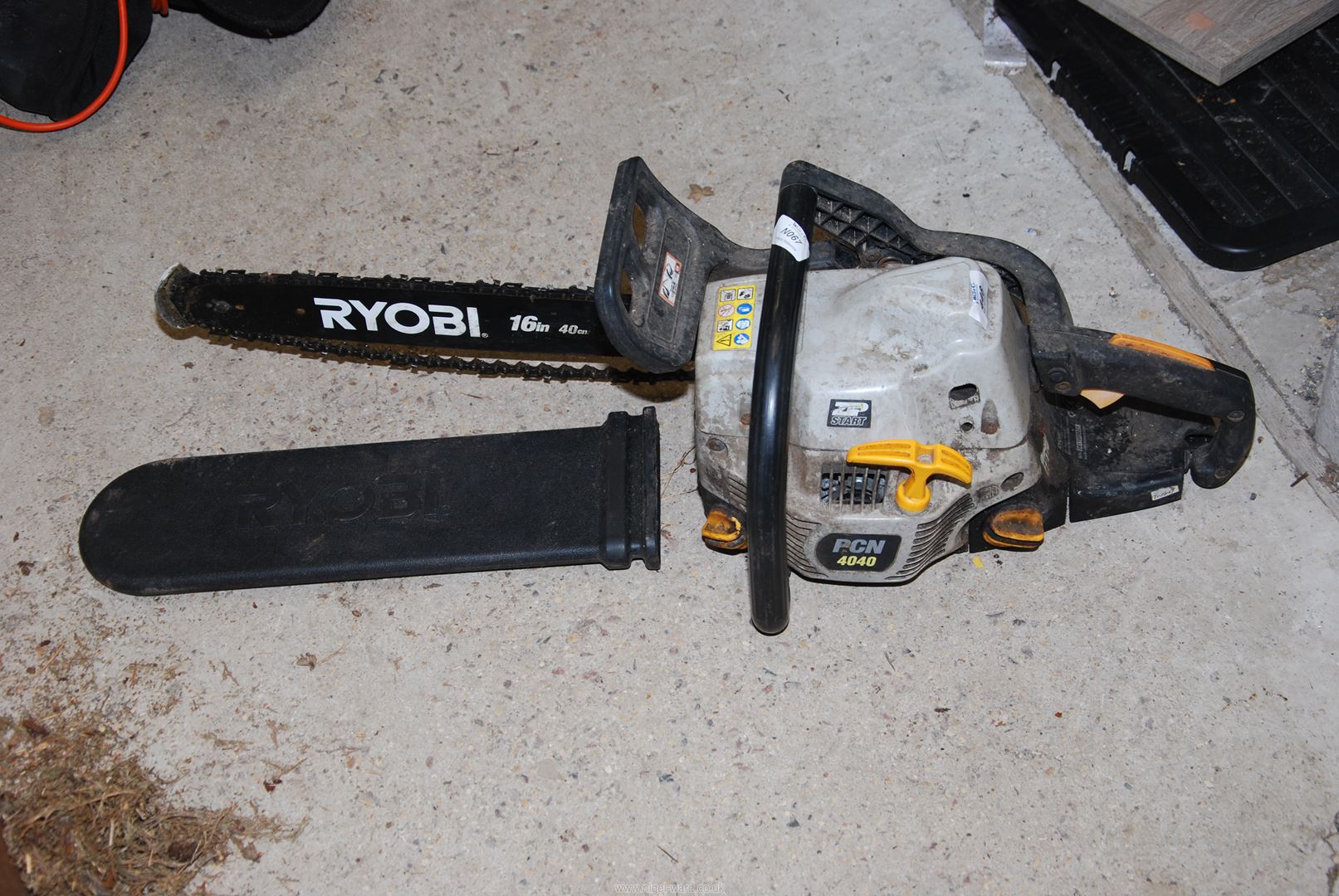 A Ryobi chainsaw, 16" cutter bar, chain brake working.
