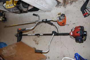 A 'Toro' strimmer (good compression) and another strimmer for spares and repairs.