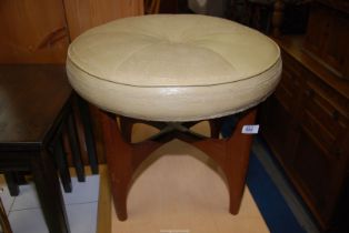 A beige topped G-Plan style Stool, 17 1/2'' high x 20'' diameter.