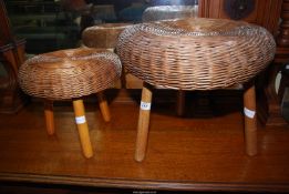 Two wicker stools.