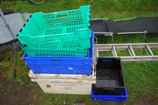 A quantity of plastic crates.