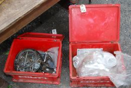 Two boxes of water downspout fittings, a tub of large bolts, screws, large spanner, etc.