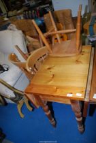 A pine drop leaf table with four chairs 31" x 30" high, 9" extension, closed 22".