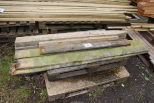 Two x 5" x 3" softwood Posts, and eight x 6" x 1" softwood boards 76" long.