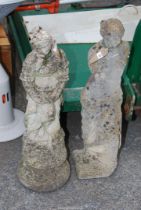 Two concrete figures of ladies 34" high.