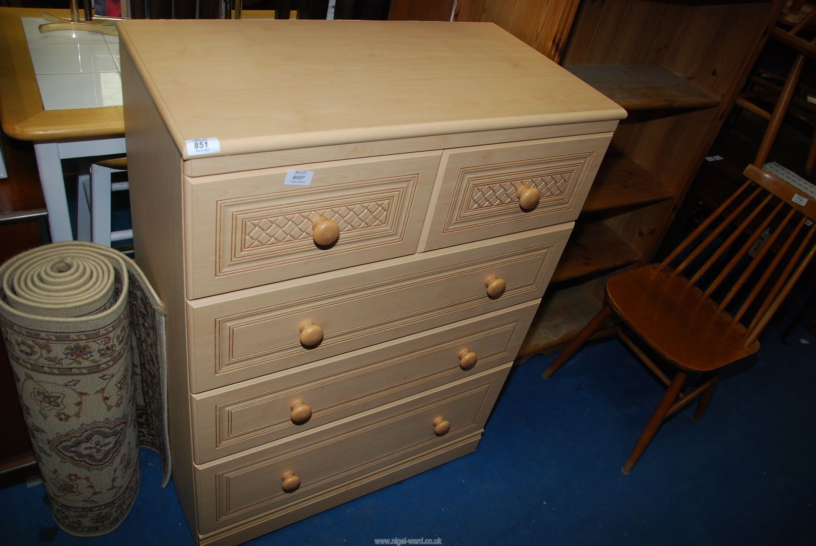 A light woodgrain chest of two short over three long drawers by Alston Furniture,