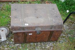 A metal trunk with contents - hand basin brackets, fire extinguisher multi purpose, rodent trap.