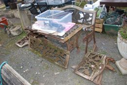 A garden table and bench with cast iron centres, in need of restoration plus a mitre saw.