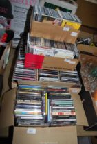 Four boxes of CD's, and box of electrical cable and chargers, etc.