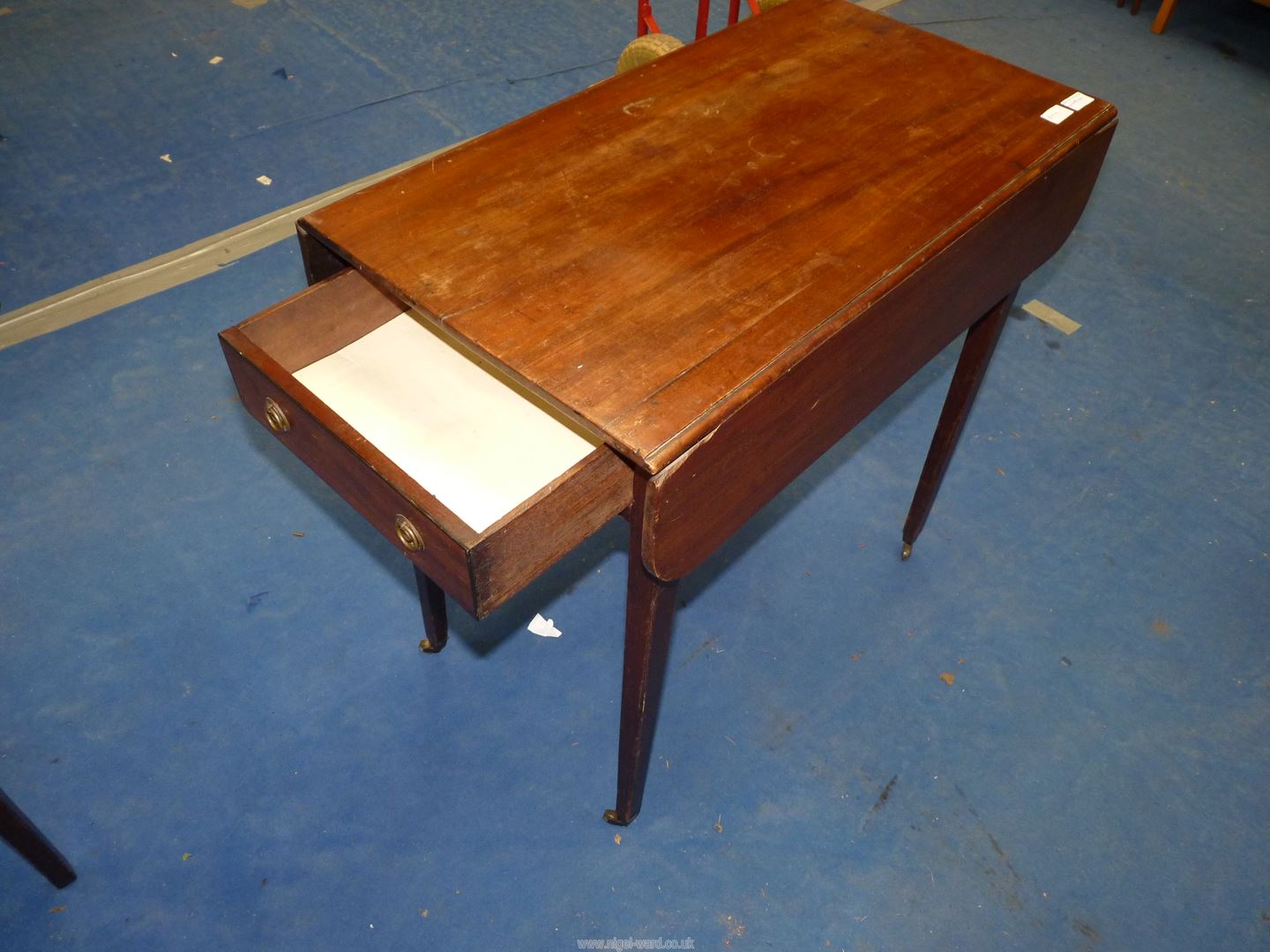 A Mahogany Pembroke table, standing on tapering square legs with brass castors, with drawer, - Image 3 of 3