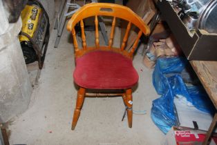 Three kitchen chairs.