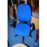 A blue office/typists chair.