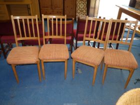 Four dining chairs.