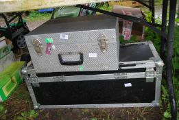 An Aluminium case plus a trunk.
