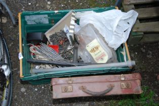 Long bolts lead wire, old leather suitcase.