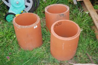 Three clay pipes, 10 1/2" diameter x 12" deep.