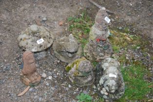 Garden ornaments, pig, frog, duck and a small gnome.