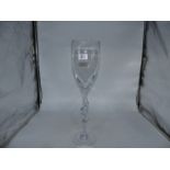 A tall clear glass goblet style vase with long twisted stem, 19 1/2" 5" wide.
