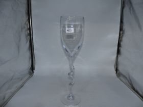 A tall clear glass goblet style vase with long twisted stem, 19 1/2" 5" wide.