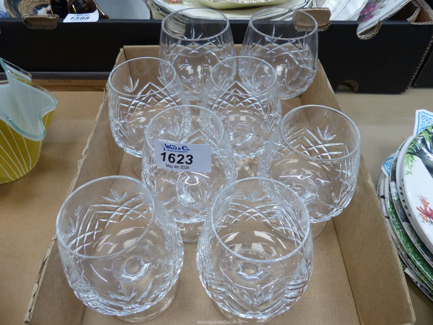 Eight cut glass brandy goblets (6 matching).