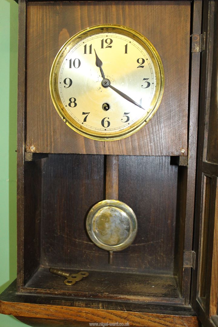 A Hermle Oak cased Wall clock having bevelled glass panels, - Image 2 of 2