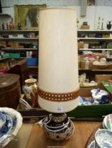 A 1960's West German ceramic lamp with original shade.