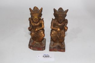 A fine pair of carved and gilded small guardian figures, Cambodia (or Indonesia), 18th -19th c.