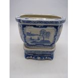 A large blue and white Oriental Planter and stand.