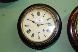 An unusually small ebonised cased single train movement Wall Clock having Roman numerals,