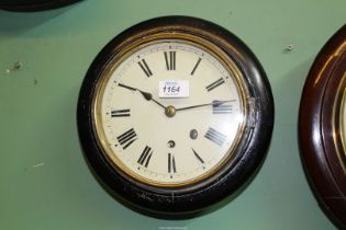 An unusually small ebonised cased single train movement Wall Clock having Roman numerals,