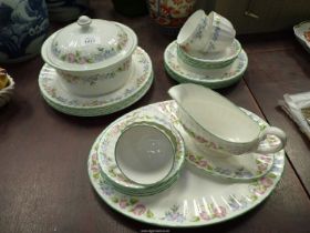 A Royal Worcester four place setting part Dinner/Tea service in "English Garden" pattern.