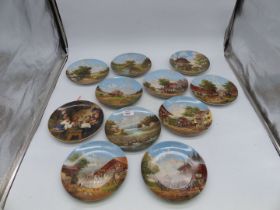 A quantity of Austrian Bradex display plates of rural continental scenes.