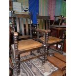 A set of six Oak framed Dining Chairs including a pair of carvers,