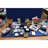 A quantity of miscellanea including, Stratton compacts, wooden box of embossing stamps,