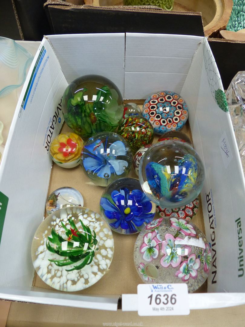 A quantity of paperweights including; pink floral Murano, Millefiori, blue yellow & green,