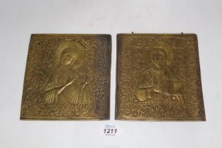 An unusual near pair of cast brass Russian icons, 18th - 19th c.