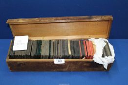 A wooden box of over 100 Magic Lantern Slides including; cattle, domestic, rural, Royalty,