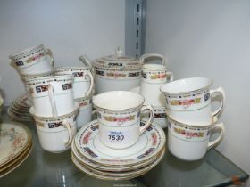 A part 'The Whithall China' Teaset to include teapot, teapot stand, nine cups,