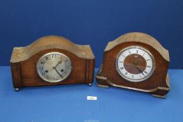 Two two-train Mantle Clocks, both with pendulums and keys; one being by Smiths with cracked glass.
