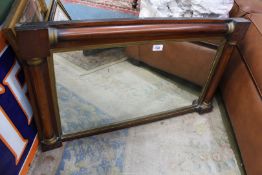 An Overmantle Mirror with pillars to either side, 33'' wide x 20 1/2'' high.
