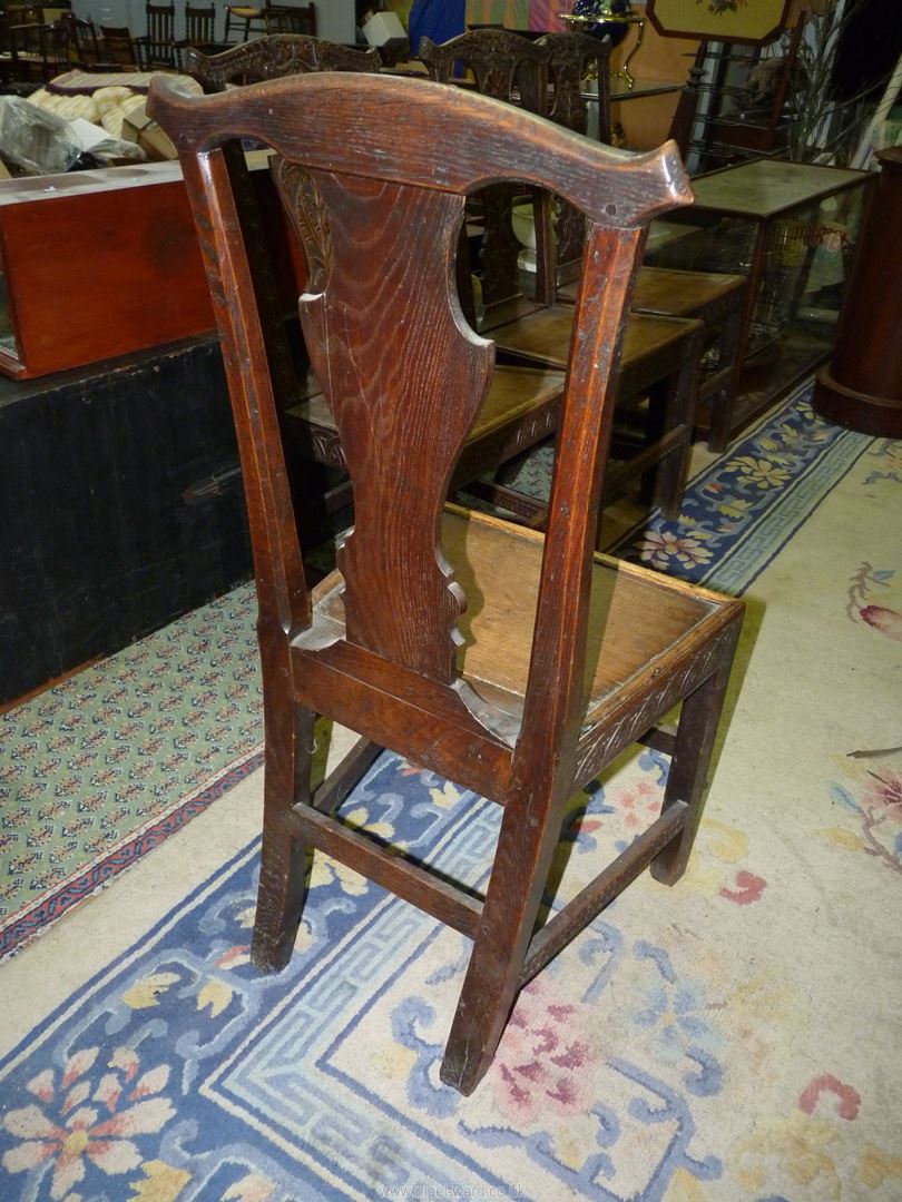 A set of four carved early Oak Dining Chairs having solid seats, - Image 3 of 5