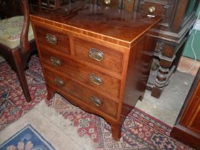 A contemporary boxwood beaded Mahogany Chest of two long and two short Drawers of diminutive size,