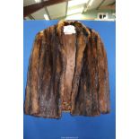 A mink (?) short fur coat by Maxwell Croft.