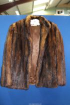 A mink (?) short fur coat by Maxwell Croft.