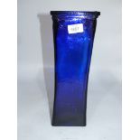 A very heavy cobalt blue square glass vase with slightly curved form, 14" tall, 5" square.