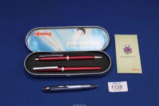A Rotring mechanical pencil and a Rotring 'Freeway' red fountain pen and ballpoint pen cased set.