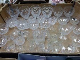 A quantity of cut glass hock, whisky and wine glasses.