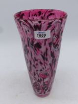 A heavy Czech style tapered glass vase, with plum, pink and cream close packed swirls and streaks.