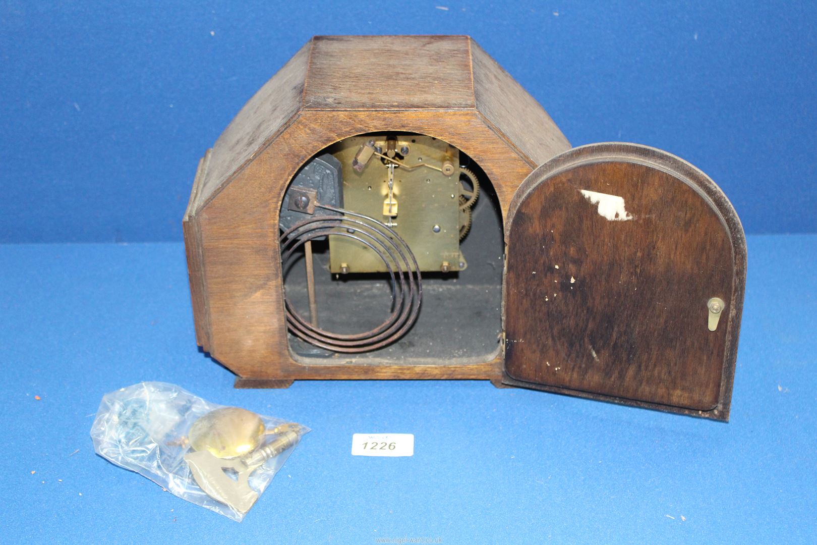 An oak two train Art Deco style Mantle Clock having Arabic numerals with pendulum and key, - Image 4 of 4